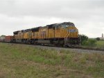 UP 5199  14Apr2011  NB across Center Point Road riding the rear of Train 7444 with stacks 